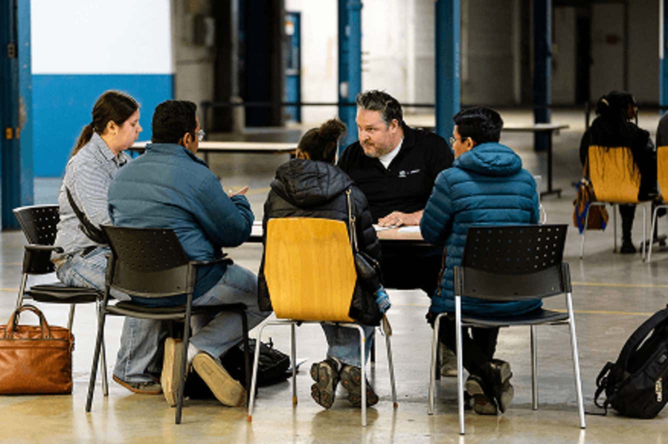 Image showing a group of people in chairs having a group discussion